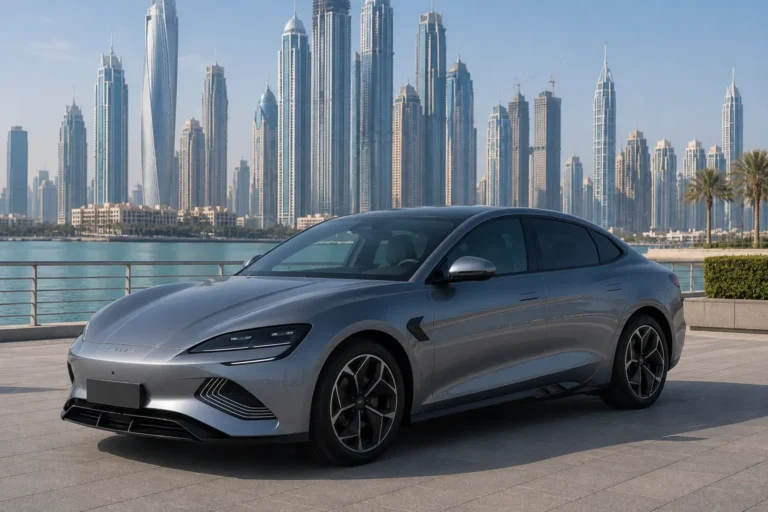 Grey BYD Seal 2024 parked in a modern Dubai waterfront location with iconic skyline in the background, showcasing a premium electric sedan.