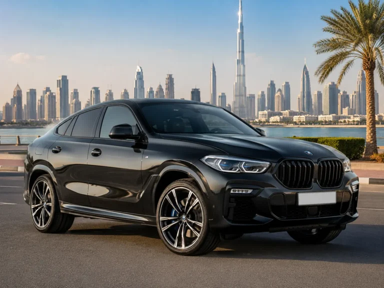 BMW X6 xDrive40i rental Dubai luxury SUV parked with the iconic Dubai skyline in the background, showcasing a premium black exterior and elegant design for chauffeur-driven travel.